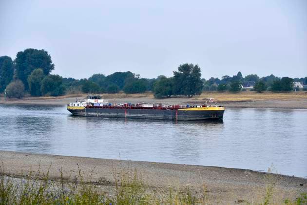 ABB RHEIN Stolt Main is a Type C inland tanker in the Rhine navigation channel on the low-water side of the Rhine, near Düsseldorf-Oberkassel. Currently, vessel traffic on the Rhine near Oberkassel is restricted. Rhine Bridge. Inland waterway vessel, cargo s