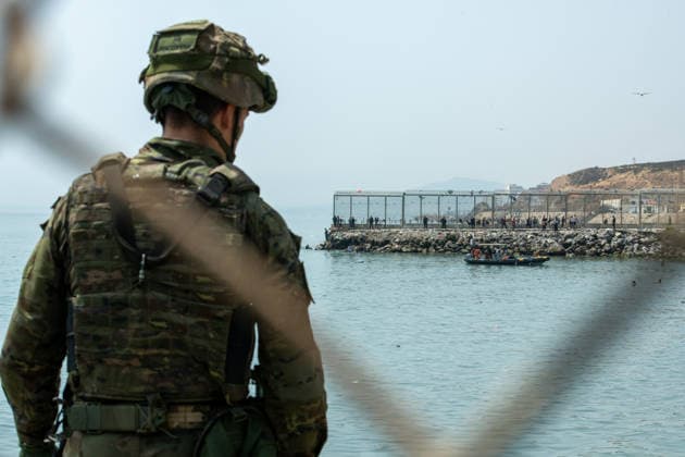 July 31, 2026, Ceuta, Ceuta, Spain: Soldiers monitor the situation as hundreds of migrants attempt to swim from Morocco to the Spanish city of Ceuta in North Africa. Ceuta Spain  - ZUMAd308 20260731_zsp_d308_054 Copyright: xJuanxCarlosxLucasx