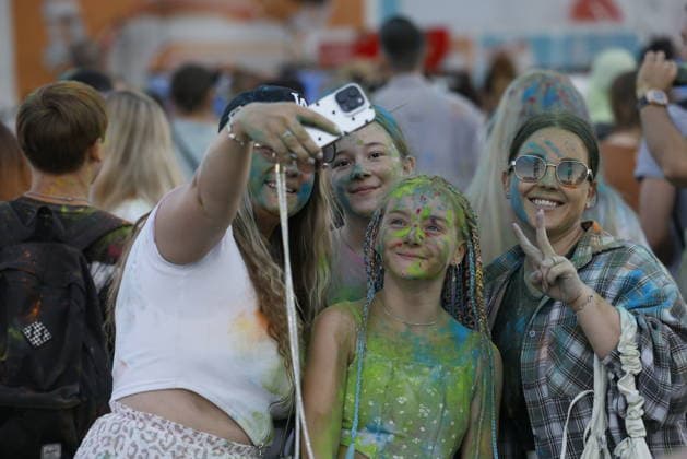 Holi Festival of Colors in Moscow, MOSCOW, RUSSIA - JULY 31: People throw colored powder into the air as they celebrate the Holi Festival of Colors in Moscow, Russia on July 31, 2026. The traditional Indian festival, which symbolizes the arrival of spring and the victory of good over evil, has become a popular entertainment event among locals, drawing thousands of participants who dance to music and cover each other in vibrant powders. Yulia Morozova Anadolu Moscow City Rusya. Editorial use only. Please get in touch for any other usage.  Copyright: x2026xAnadoluxYuliaxMorozovax