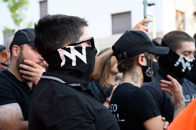July 31, 2026, Madrid, Spain: MADRID, SPAIN Ã¢â‚¬ JULY 31, 2026: Participants attend a demonstration outside the Moroccan Embassy in Madrid, called by the far-right groups Falange EspaoÂ±ola and NoÂºcleo Nacional, following recent migrant arrivals through Spain s North African enclave of Ceuta. Protesters wave Spanish flags, display banners and chant slogans during the demonstration, while some participants are seen making gestures commonly associated with Nazi salutes. Madrid Spain  - ZUMAq101 20260731_zna_q101_215 Copyright: xTomasxCallex
