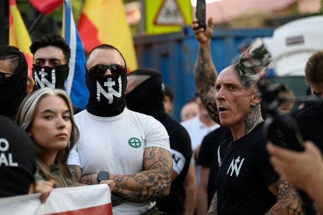 July 31, 2026, Madrid, Spain: MADRID, SPAIN Ã¢â‚¬ JULY 31, 2026: Participants attend a demonstration outside the Moroccan Embassy in Madrid, called by the far-right groups Falange EspaoÂ±ola and NoÂºcleo Nacional, following recent migrant arrivals through Spain s North African enclave of Ceuta. Protesters wave Spanish flags, display banners and chant slogans during the demonstration, while some participants are seen making gestures commonly associated with Nazi salutes. Madrid Spain  - ZUMAq101 20260731_zna_q101_222 Copyright: xTomasxCallex
