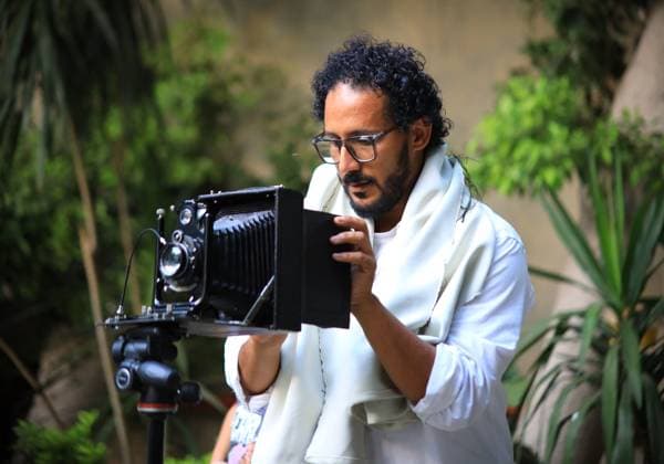 August 1, 2026, Cairo, Egypt: CAIRO, EGYPT Ã¢â‚¬ JULY 2026: Egyptian photojournalist Fareed Kotb poses with his restored 1930 Zeiss Ikon camera in Cairo, Egypt. Kotb gained international recognition for using the nearly century-old camera during his Project 1930, documenting the FIFA World Cup 2026 with a vintage camera manufactured in the same year as the inaugural FIFA World Cup. Cairo Egypt  - ZUMAq101 20260801_zna_q101_002 Copyright: xAbdullahxHamadax