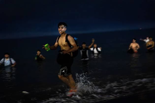 August 1, 2026, Ceuta, Spain: CEUTA, SPAIN - AUGUST 1, 2026: The arrival of migrants across the Tarajal border continues during the early hours of Saturday morning in Ceuta. Authorities maintain security and monitoring devices at the border crossing amid the ongoing influx. Ceuta Spain  - ZUMAq101 20260801_zna_q101_058 Copyright: xSamuelxVegax