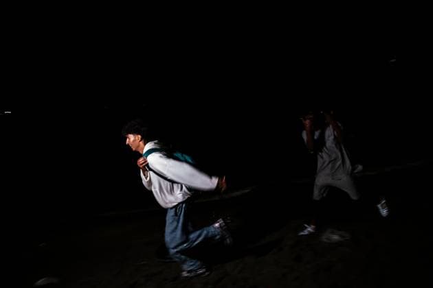 August 1, 2026, Ceuta, Spain: CEUTA, SPAIN - AUGUST 1, 2026: The arrival of migrants across the Tarajal border continues during the early hours of Saturday morning in Ceuta. Authorities maintain security and monitoring devices at the border crossing amid the ongoing influx. Ceuta Spain  - ZUMAq101 20260801_zna_q101_063 Copyright: xSamuelxVegax
