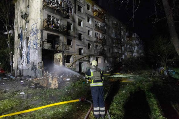 A State Emergency Service rescuer sprays water at the damaged structures of a five-storey apartment block in the Solomianskyi district, partially destroyed by an overnight Russian missile strike, Kyiv, Ukraine, August 1, 2026. The attack caused partial collapse and fire in the building. Rescue workers evacuated 35 residents from the upper floors. Two people were killed and eight injured.(Photo by Kyrylo Chubotin Ukrinform) Russian attack damages apartment block in Kyiv’s Solomianskyi district  Copyright: xKyryloxChubotinx