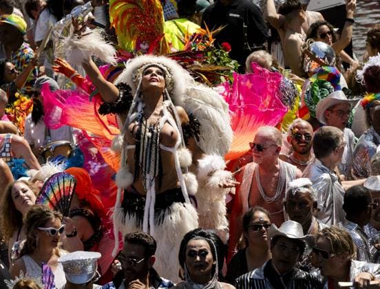 AMSTERDAM - Revelers during the Canal Parade. The boat parade is traditionally part of the Pride celebrations in the capital. REMKO DE WAAL ANP netherlands out - belgium out  Copyright: xx x564690406x originalFilename: 564690406.jpg