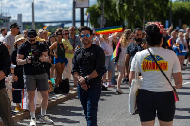 August 1, 2026, Stockholm, Sweden: STOCKHOLM, SWEDEN - AUGUST 1, 2026: Swedish right-wing commentator and journalist Nick Alinia covers the Stockholm Pride Parade, the largest Pride parade in the Nordic region, in central Stockholm. Thousands of people took part in the annual parade celebrating LGBTQ rights, diversity and inclusion. Sweden - ZUMAa136 20260801_zap_a136_009 Copyright: xJoelxLindhex