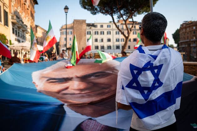 August 1, 2026, Rome, Rm, Italy: Members of the anti-regime Iranian community in Rome gather in Largo Torre Argentina. They are protesting against the repression and executions of opponents carried out by the Iranian regime and support the return to power of Crown Prince Reza Pahlavi. Rome Italy - ZUMAg256 20260801_znp_g256_002 Copyright: xMarcoxDixGianvitox