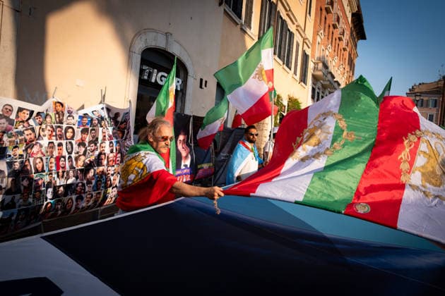 August 1, 2026, Rome, Rm, Italy: Members of the anti-regime Iranian community in Rome gather in Largo Torre Argentina. They are protesting against the repression and executions of opponents carried out by the Iranian regime and support the return to power of Crown Prince Reza Pahlavi. Rome Italy  - ZUMAg256 20260801_znp_g256_010 Copyright: xMarcoxDixGianvitox