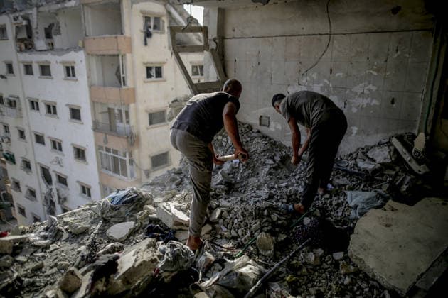 Israeli attacks on Gaza continue despite the ceasefire GAZA CITY, GAZA, PALESTINE - AUGUST 2: Palestinians inspect the rubble of the Abu Latif house hit by an Israeli strike in the port area of Gaza City, Gaza, Palestine on August 02, 2026. It is reported that the attack killed and injured many Palestinians. Saeed M. M. T. Jaras Anadolu Gaza City Gaza. Editorial use only. Please get in touch for any other usage.  Copyright: x2026xAnadoluxSaeedxM.xM.xT.xJarasx
