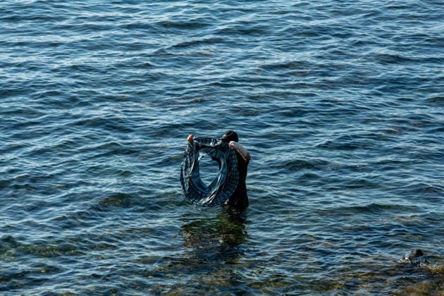 August 2, 2026, Ceuta, Madrid, Spain: A migrant attempts to swim across the border under the watchful eye of the Spanish Civil Guard at El Tarajal beach in Ceuta, Spain, August 2, 2026. Ceuta Spain - ZUMAd308 20260802_zsp_d308_034 Copyright: xJuanxCarlosxLucasx