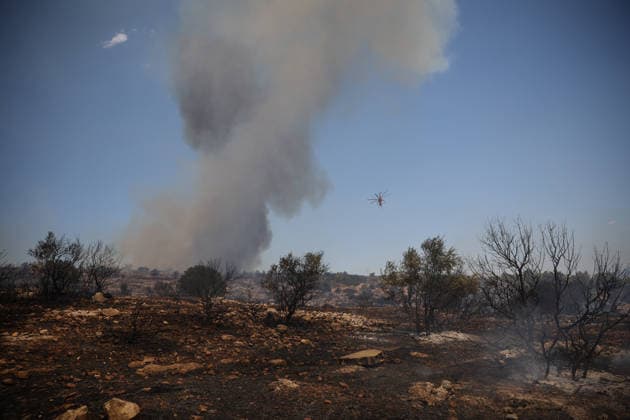 Wildfire in Greece s Megara region MEGARA, GREECE - AUGUST 3: Firefighters operate on the air as a wildfire continues to burn for a third consecutive day in the Megara region, west of Athens, Greece on August 3, 2026. Emergency services are working to contain the blaze amid challenging weather conditions across the area. Aris Oikonomou Anadolu Megara Greece. Editorial use only. Please get in touch for any other usage.  Copyright: x2026xAnadoluxArisxOikonomoux