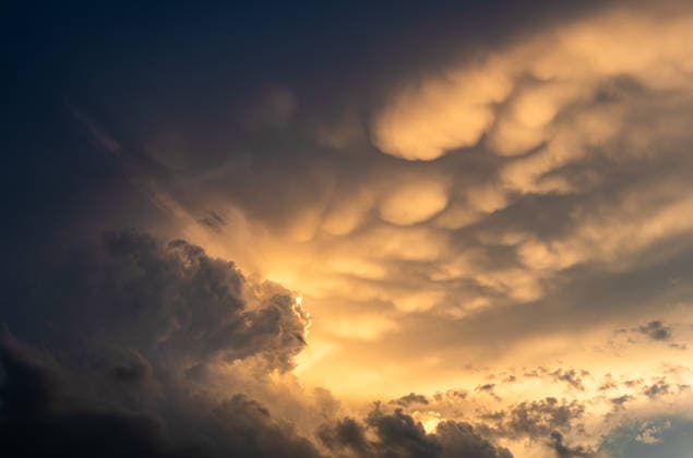 Evening sky in the Proximity from Pfaffenhofen to the Ilm, in Bavaria, with Mammoth Clouds and just teasing Thunderclouds 1047102057