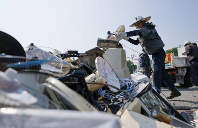 Aftermath of strong earthquake in Kumamoto Disaster waste is brought to a temporary storage site in Hikawa, Kumamoto Prefecture, on Aug. 4, 2026, following a powerful earthquake that struck the southwestern Japan prefecture.  A14AA0005625029P
