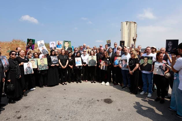 August 4, 2026, Beirut, Beirut, lebanon: Families of victims of the August 4, 2020 Beirut port explosion gather inside the Beirut Port in front of the memorial bearing the names of Lebanese and foreign victims, marking the sixth anniversary of the devastating blast, in Beirut, Lebanon, August 4, 2026. Beirut lebanon - ZUMAb339 20260804_znp_b339_003 Copyright: xAbdulxKaderxAlxBayx