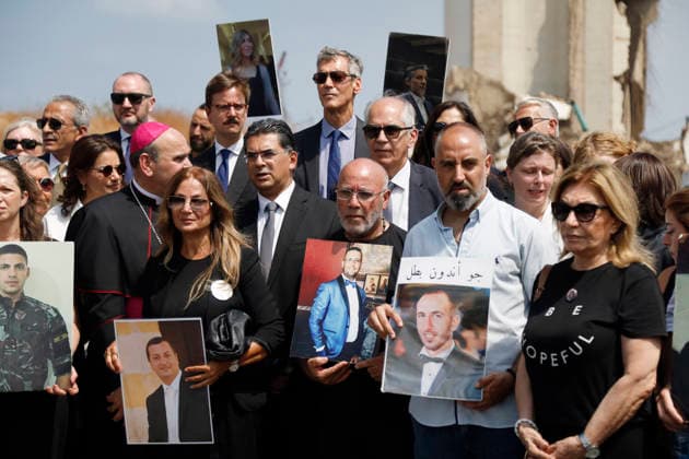 August 4, 2026, Beirut, Beirut, lebanon: Families of victims of the August 4, 2020 Beirut port explosion gather inside the Beirut Port in front of the memorial bearing the names of Lebanese and foreign victims, marking the sixth anniversary of the devastating blast, in Beirut, Lebanon, August 4, 2026. Beirut lebanon - ZUMAb339 20260804_znp_b339_006 Copyright: xAbdulxKaderxAlxBayx