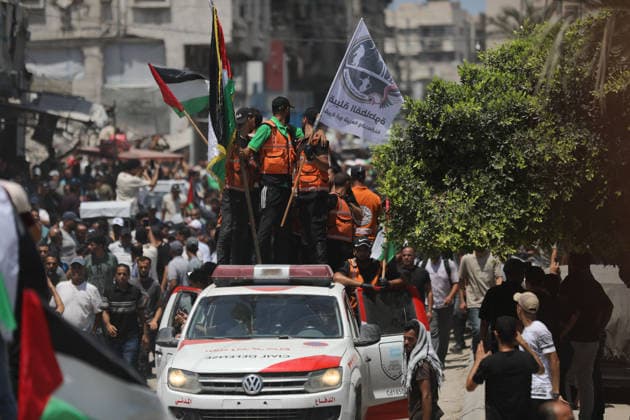 Mass funeral held for recovered remains in Gaza City s Sabra neighborhood Palestinians take part in a mass funeral for the recovered remains of members of the Abu Sharia and Al-Hasayna families in the Sabra neighborhood of Gaza City on August 4, 2026. The remains were recently recovered from beneath the rubble of their homes, which were destroyed in an Israeli strike earlier in the war. Gaza s Civil Defense said its crews recovered the remains of 112 people during a two-week operation in the residential area where the two families lived, which it said was hit in an Israeli airstrike on November 23, 2023. The Civil Defense estimates that more than 9,000 people remain missing or buried beneath the rubble of destroyed buildings across the Gaza Copyright: xapaimagesxBilalxOsamax xapaimagesx