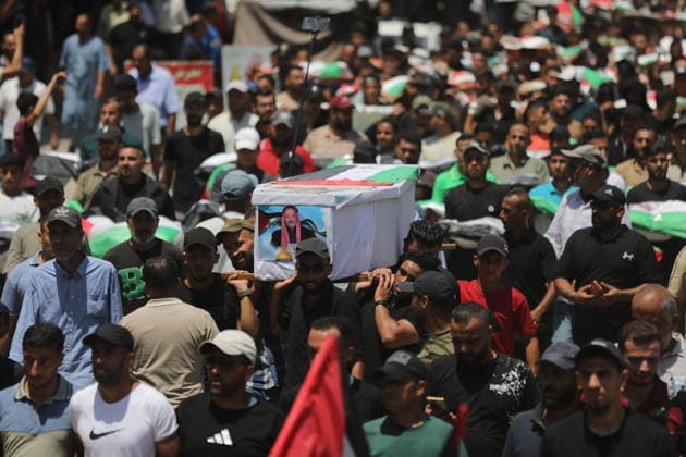 Mass funeral held for recovered remains in Gaza City s Sabra neighborhood Palestinians take part in a mass funeral for the recovered remains of members of the Abu Sharia and Al-Hasayna families in the Sabra neighborhood of Gaza City on August 4, 2026. The remains were recently recovered from beneath the rubble of their homes, which were destroyed in an Israeli strike earlier in the war. Gaza s Civil Defense said its crews recovered the remains of 112 people during a two-week operation in the residential area where the two families lived, which it said was hit in an Israeli airstrike on November 23, 2023. The Civil Defense estimates that more than 9,000 people remain missing or buried beneath the rubble of destroyed buildings across the Gaza Copyright: xapaimagesxBilalxOsamax xapaimagesx