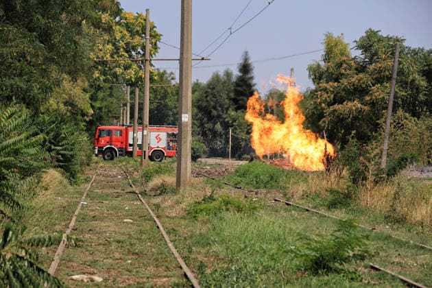 A fire caused by a Russian missile attack burns near railway tracks in Odesa, Ukraine, August 4, 2026. Russian forces carried out a missile strike near a market on the outskirts of the city. Civilian infrastructure was damaged, and at least three people were injured. (Photo by Nina Liashonok Ukrinform) Russia attacks suburbs of Odesa with missiles  Copyright: xNinaxLiashonokx