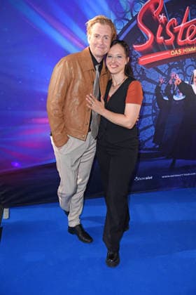 Johannes Heinrichs with his wife Nadja Jo Klapper at the premiere of SISTER ACT: THE HEAVENLY MUSICAL at the Bluemax Theater in Berlin on August 4, 2026