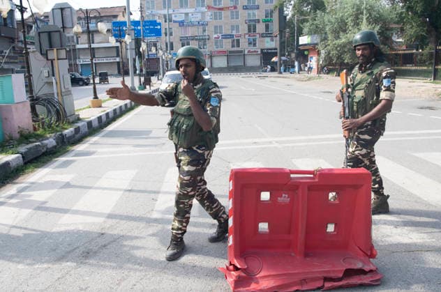 August 5, 2026, Srinagar, Jammu And Kashmir, India: Security personnel near temporary checkpointon the seventh anniversary of the abrogation of Article 370 and Jammu and Kashmir s special status,in Srinagar, Jammu and Kashmir, India, on August 5, 2026. Today marks the seventh anniversary of the abrogation of Article 370. On August 5, 2019, the Government of India revokes Article 370 of the Constitution, which grants special status to Jammu and Kashmir, and bifurcates the state into two union territories--Jammu and Kashmir, and Ladakh. Srinagar India - ZUMAz120 20260805_zip_z120_010 Copyright: xBasitxZargarx