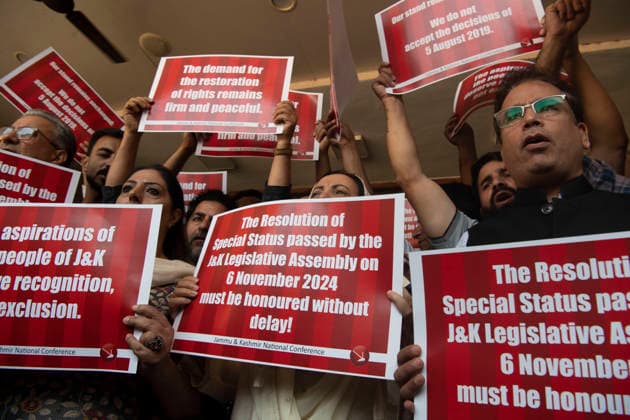 August 5, 2026, Srinagar, Jammu And Kashmir, India: National Conference leaders and workers hold placards during a protest marking the seventh anniversary of the abrogation of Article 370 and the revocation of Jammu and Kashmir s special status, in Srinagar. Today marks the seventh anniversary of the abrogation of Article 370. On August 5, 2019, the Government of India revokes Article 370 of the Constitution, which grants special status to Jammu and Kashmir, and bifurcates the state into two union territories--Jammu and Kashmir, and Ladakh. Srinagar India  - ZUMAz120 20260805_zip_z120_017 Copyright: xBasitxZargarx