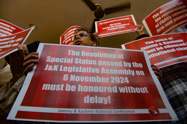 August 5, 2026, Srinagar, Jammu And Kashmir, India: National Conference leaders and workers hold placards during a protest marking the seventh anniversary of the abrogation of Article 370 and the revocation of Jammu and Kashmir s special status, in Srinagar. Today marks the seventh anniversary of the abrogation of Article 370. On August 5, 2019, the Government of India revokes Article 370 of the Constitution, which grants special status to Jammu and Kashmir, and bifurcates the state into two union territories--Jammu and Kashmir, and Ladakh. Srinagar India  - ZUMAz120 20260805_zip_z120_018 Copyright: xBasitxZargarx