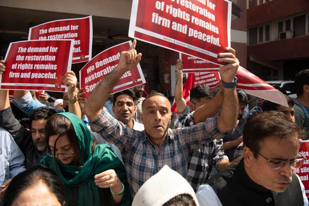 August 5, 2026, Srinagar, Jammu And Kashmir, India: National Conference leaders and workers hold placards during a protest marking the seventh anniversary of the abrogation of Article 370 and the revocation of Jammu and Kashmir s special status, in Srinagar. Today marks the seventh anniversary of the abrogation of Article 370. On August 5, 2019, the Government of India revokes Article 370 of the Constitution, which grants special status to Jammu and Kashmir, and bifurcates the state into two union territories--Jammu and Kashmir, and Ladakh. Srinagar India  - ZUMAz120 20260805_zip_z120_019 Copyright: xBasitxZargarx