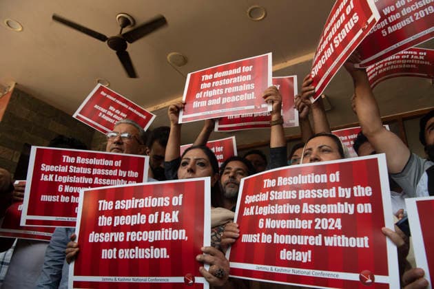August 5, 2026, Srinagar, Jammu And Kashmir, India: National Conference leaders and workers hold placards during a protest marking the seventh anniversary of the abrogation of Article 370 and the revocation of Jammu and Kashmir s special status, in Srinagar. Today marks the seventh anniversary of the abrogation of Article 370. On August 5, 2019, the Government of India revokes Article 370 of the Constitution, which grants special status to Jammu and Kashmir, and bifurcates the state into two union territories--Jammu and Kashmir, and Ladakh. Srinagar India  - ZUMAz120 20260805_zip_z120_024 Copyright: xBasitxZargarx