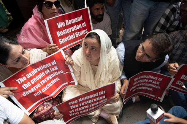 August 5, 2026, Srinagar, Jammu And Kashmir, India: National Conference leaders and workers hold placards during a protest marking the seventh anniversary of the abrogation of Article 370 and the revocation of Jammu and Kashmir s special status, in Srinagar. Today marks the seventh anniversary of the abrogation of Article 370. On August 5, 2019, the Government of India revokes Article 370 of the Constitution, which grants special status to Jammu and Kashmir, and bifurcates the state into two union territories--Jammu and Kashmir, and Ladakh. Srinagar India  - ZUMAz120 20260805_zip_z120_025 Copyright: xBasitxZargarx