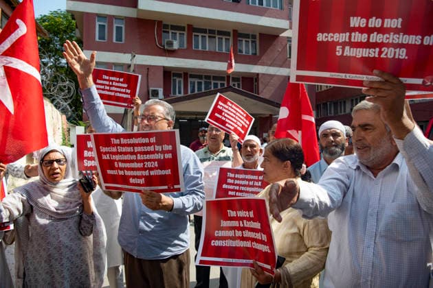 August 5, 2026, Srinagar, Jammu And Kashmir, India: National Conference leaders and workers hold placards during a protest marking the seventh anniversary of the abrogation of Article 370 and the revocation of Jammu and Kashmir s special status, in Srinagar. Today marks the seventh anniversary of the abrogation of Article 370. On August 5, 2019, the Government of India revokes Article 370 of the Constitution, which grants special status to Jammu and Kashmir, and bifurcates the state into two union territories--Jammu and Kashmir, and Ladakh. Srinagar India  - ZUMAz120 20260805_zip_z120_028 Copyright: xBasitxZargarx