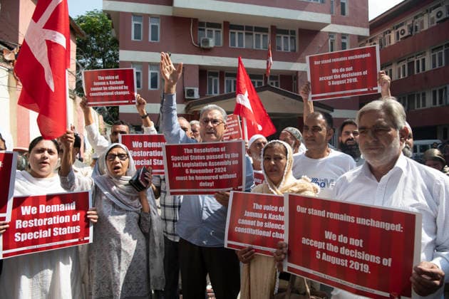August 5, 2026, Srinagar, Jammu And Kashmir, India: National Conference leaders and workers hold placards during a protest marking the seventh anniversary of the abrogation of Article 370 and the revocation of Jammu and Kashmir s special status, in Srinagar. Today marks the seventh anniversary of the abrogation of Article 370. On August 5, 2019, the Government of India revokes Article 370 of the Constitution, which grants special status to Jammu and Kashmir, and bifurcates the state into two union territories--Jammu and Kashmir, and Ladakh. Srinagar India  - ZUMAz120 20260805_zip_z120_030 Copyright: xBasitxZargarx