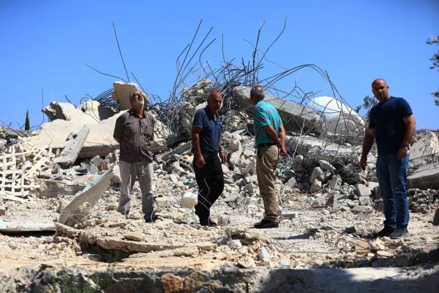 Israeli forces demolish two Palestinian homes in Nahhalin BETHLEHEM, WEST BANK, PALESTINE - AUGUST 5: Residents inspect the area as Israeli forces, accompanied by bulldozers, demolish two Palestinian homes and a commercial property after raiding the town of Nahhalin, west of Bethlehem, West Bank, Palestine, on August 5, 2026. Wisam Hashlamoun Anadolu Bethlehem West Bank. Editorial use only. Please get in touch for any other usage.  Copyright: x2026xAnadoluxWisamxHashlamounx