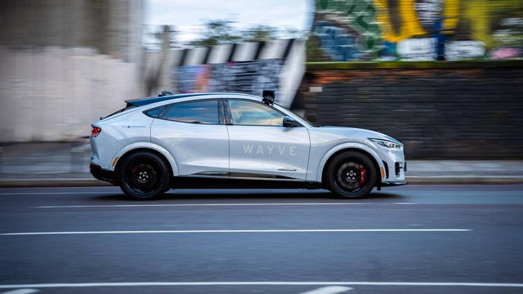 Robotaxis granted licence to operate in London An electric Ford Mustang Mach-E with Wayve AI self-driving techology drives through London, UK. Self-driving taxis have moved a step closer after Transport for London (TfL) granted private hire licences to a fleet of autonomous vehicles - on the condition that a human driver is present. Uber said inspectors had confirmed that vehicles using technology by British firm Wayve met all of TfL s policy and safety standards. Under the terms of the PHV licence, a qualified driver must be present and remain responsible for the car. Journeys could begin later this year. A TfL spokesperson said safety was its top priority and any new vehicle licensed to carry passengers in London must align with its t  Copyright: xWayvex xB66x xAvalonx 1120873243