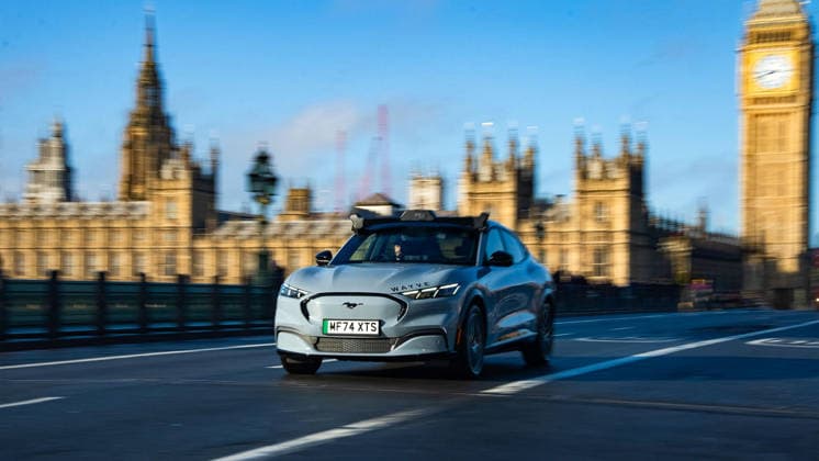 Robotaxis granted licence to operate in London An electric Ford Mustang Mach-E with Wayve AI self-driving techology drives through London, UK. Self-driving taxis have moved a step closer after Transport for London (TfL) granted private hire licences to a fleet of autonomous vehicles - on the condition that a human driver is present. Uber said inspectors had confirmed that vehicles using technology by British firm Wayve met all of TfL s policy and safety standards. Under the terms of the PHV licence, a qualified driver must be present and remain responsible for the car. Journeys could begin later this year. A TfL spokesperson said safety was its top priority and any new vehicle licensed to carry passengers in London must align with its t  Copyright: xWayvex xB66x xAvalonx 1120873244