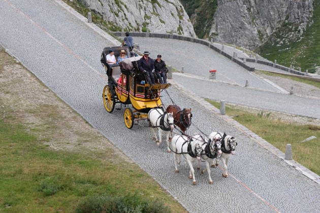 August 5, 2026 Switzerland Horses, Historic Gotthard Stagecoaches Day trips along the legendary route from Andermatt over the Gotthard Pass and the Tremola Road to Airolo Photo: Horse-drawn carriage on the Tremola Road