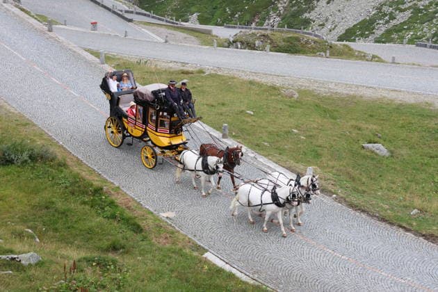 August 5, 2026 Switzerland Horses, Historic Gotthard Stagecoaches Day trips along the legendary route from Andermatt over the Gotthard Pass and the Tremola Road to Airolo Photo: Horse-drawn carriage on the Tremola Road
