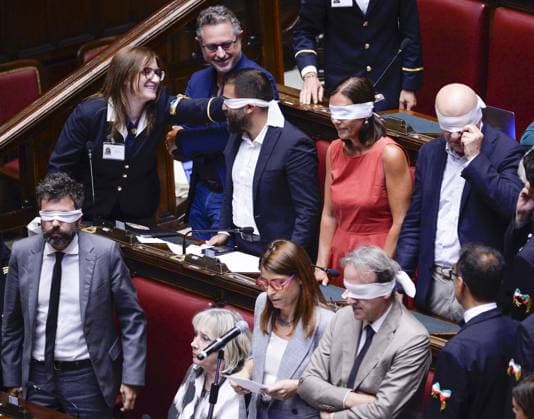 IPP Photo by Marco Mattei, Rome, August 5, 2026: Chamber of Deputies debate and vote on the authorization to seize Delmastro’s chat records. Pictured: the AVS protest, with deputies covering their eyes with blindfolds. Italy Photo Press World Copyright