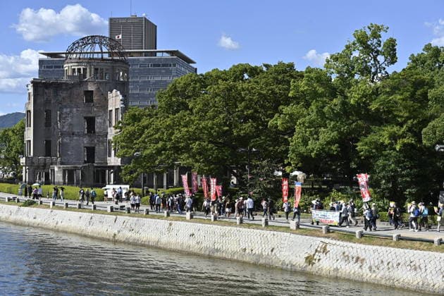 Japan marks 81st anniversary of the atomic bombing of Hiroshima HIROSHIMA, JAPAN - AUGUST 6 : Anti-war demonstrators march past the Atomic Bomb Dome during a protest against war and the policies of Japanese Prime Minister Sanae Takaichi, in Hiroshima, Japan, on August 6, 2026. Several protest groups converged near the dome in the afternoon under a heavy police presence. David Mareuil Anadolu Hiroshima Japan. Editorial use only. Please get in touch for any other usage.  Copyright: x2026xAnadoluxDavidxMareuilx