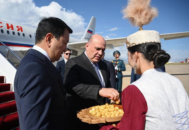 Kyrgyzstan Eurasian Intergovernmental Council 9218115 06.08.2026 Russian Prime Minister Mikhail Mishustin is welcomed by Kyrgyz Deputy Prime Minister - Minister of Water Resources, Agriculture and Processing Industry Erlist Akunbekov upon arrival at the Issyk-Kul International Airport outside Cholpon-Ata, Kyrgyzstan. Mishustin traveled to Kyrgyzstan on August 6 to attend a meeting of the Eurasian Intergovernmental Council. Kirill Zykov Sputnik Cholpon-Ata Kyrgyzstan  Copyright: xKirillxZykovx