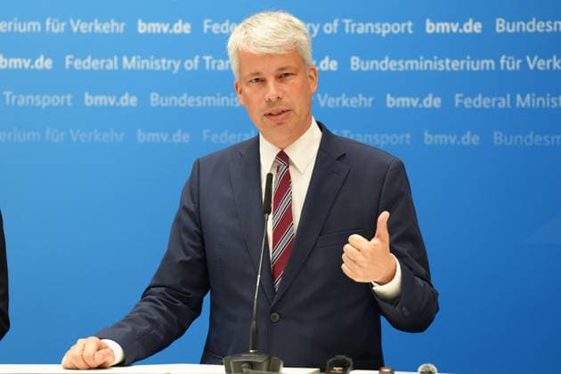 Press Conference Following High-Level Talks on Low Water Levels with Transportation Minister Bilger: A portrait of Transportation Minister Steffen Bilger gesturing during the press conference following the high-level talks on low water levels in the Rhine at the Federal Ministry of Transportation, Bonn, August 6, 2026, Bonn, North Rhine-Westphalia, Germany