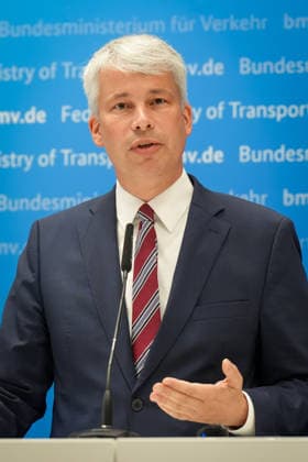 Press Conference Following High-Level Talks on Low Water Levels with Transportation Minister Bilger: A portrait of Transportation Minister Steffen Bilger gesturing during the press conference following the high-level talks on low water levels in the Rhine at the Federal Ministry of Transportation, Bonn, August 6, 2026, Bonn, North Rhine-Westphalia, Germany
