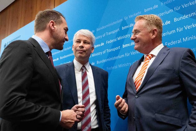From left: Steffen BAUER, CEO and Managing Director of HGK Shipping; Federal Minister of Transport Steffen BILGER; Jens SCHWANEN, Managing Director of the BDB (Federal Association of German Inland Waterway Transport), during the press conference Federal Minister of Transport Steffen Bilger invites participants to a high-level discussion on low water levels on August 6, 2026, in Bonn, Germany,