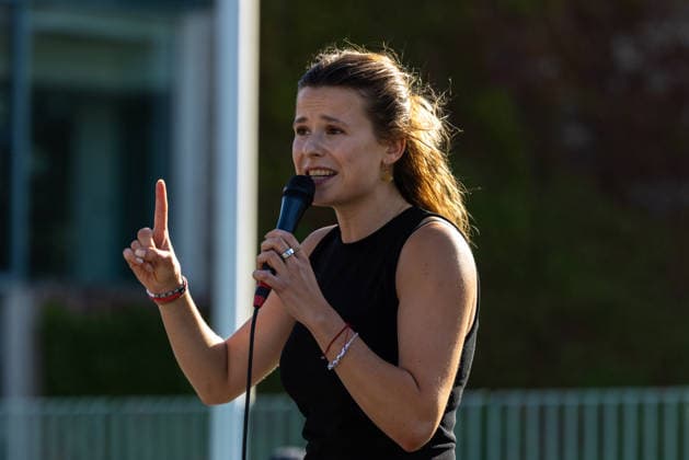Fridays for Future Berlin Heat Protest, Germany, Berlin, August 6, 2026. Luisa Neubauer addresses the protesters from the stage in front of the Chancellery. In front of the Chancellery, climate activists are protesting under the slogan The Climate Crisis Is Escalating, Chancellor Remains