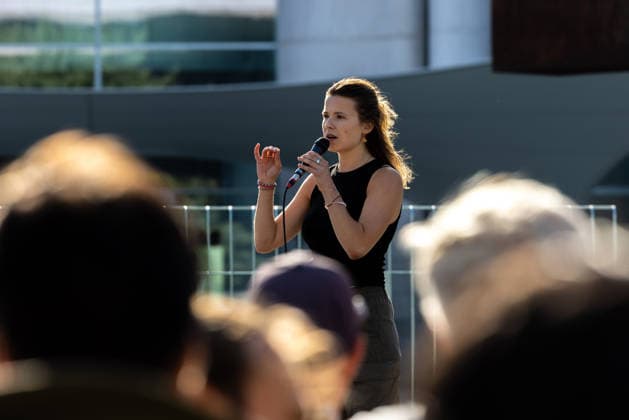 Fridays for Future Berlin Heat Protest, Germany, Berlin, August 6, 2026. Luisa Neubauer addresses the protesters from the stage in front of the Chancellery. In front of the Chancellery, climate activists are protesting under the slogan The Climate Crisis Is Escalating, Chancellor Remains