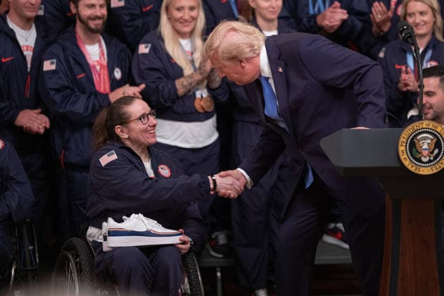 August 6, 2026, Washington, District Of Columbia, USA: Paralympic Team USA athlete Laurie Stephens is greeted by United States President Donald J Trump in the East Room of the White House in Washington, DC, USA, on Thursday, August 6, 2026. President Trump is hosting a ceremony for Team USA Olympians who competed in the 2026 Olympic Winter Games in Italy Washington USA - ZUMAs152 20260806_faa_s152_102 Copyright: xAaronxSchwartzx-xPoolxviaxCNPx