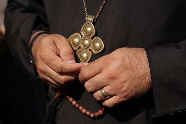 ARMENIA, YEREVAN - AUGUST 7, 2026: A clergyman is seen outside a court building ahead of a hearing against Catholicos Garegin II of All Armenians over allegations of failing to comply with a civil court order. Alexander Patrin TASS  95875932