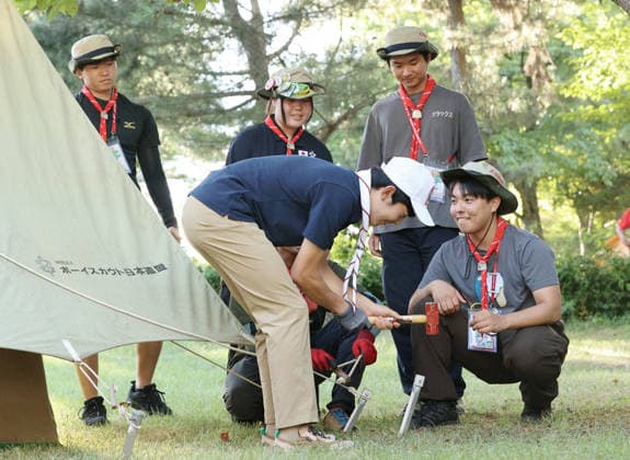 Prince Hisahito joins boy scout event in western Japan Japanese Prince Hisahito (C) sets up a tent during the 19th Nippon Scout Jamboree in Jinsekikogen in Hiroshima Prefecture, western Japan, on Aug. 7, 2026. (Pool photo)  A14AA0005625347P