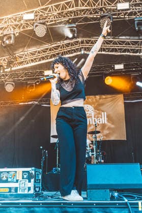 Singer Oli from the band Melonball performing live on August 7, 2026, on the Sounds For Nature Stage at the 30th Taubertal Festival in Rothenburg ob der Tauber. This year, the long-standing open-air festival is celebrating its 30th anniversary.