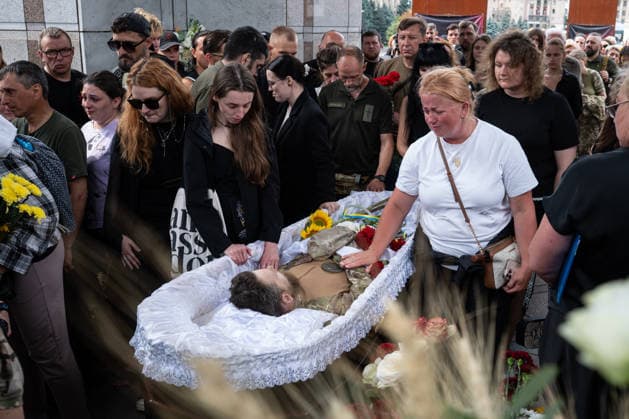 Hundreds attend the funeral of search and rescue volunteer Oleksii Yukov in Kyiv KYIV, UKRAINE - AUGUST 08: (EDITOR S NOTE: Image depicts death) Hundreds attend the funeral of search and rescue volunteer Oleksii Yukov in Kyiv, Ukraine, on August 08, 2026. Yukov was killed during a mission to retrieve the bodies of fallen Ukrainian soldiers in Donetsk region of Ukraine. Yukov had been conducting search and rescue missions to retrieve bodies of fallen Ukrainian soldiers sjnce 2014. Danylo Antoniuk Anadolu Kyiv Ukraine. Editorial use only. Please get in touch for any other usage.  Copyright: x2026xAnadoluxDanyloxAntoniukx
